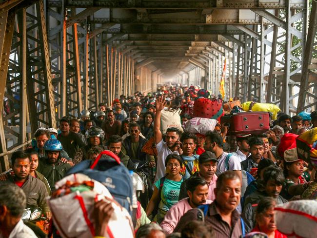 Hindu pilgrims walk during the Maha Kumbh Mela festival in Prayagraj. A pre-dawn stampede killed at least 30 people in India. Picture: AFP