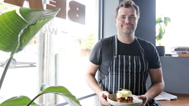 Bear With Me chef Lachie Fletcher with the eggs benedict on ham hock for Five of The Best. Picture: PATRICK GEE