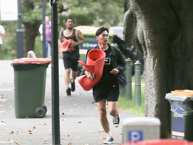 Crowds flock into Mrs Macquarie's Chair to claim positions for tonight's New Years Eve celebrations in Sydney. Picture: Dylan Robinson