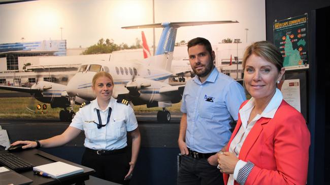 Hinterland Aviation General Manager Andrew Clair, pictured here with pilot Nicola Clark and NAIF board chair Tracey Hayes, said Hinterland Aviation will drop masks as soon as it is legally allowed to do so. Picture: Supplied.