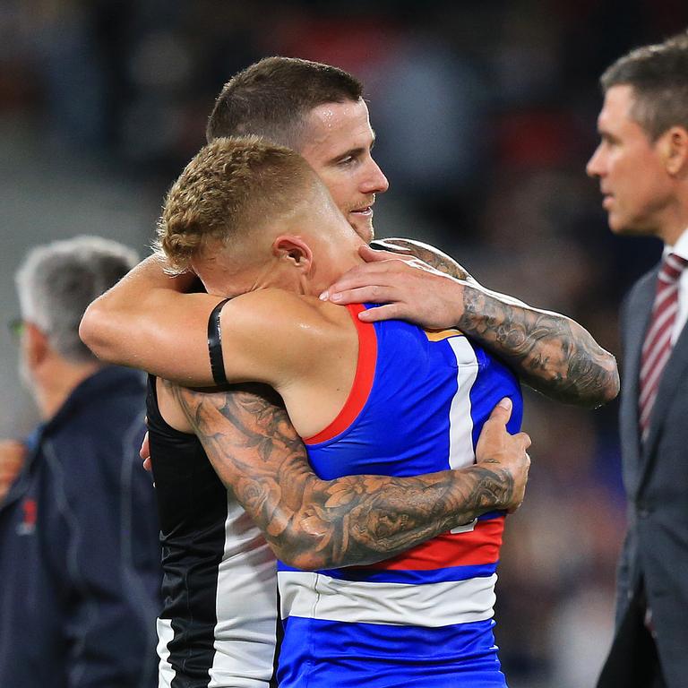 Treloar hugs Jeremy Howe post match. Picture: Mark Stewart