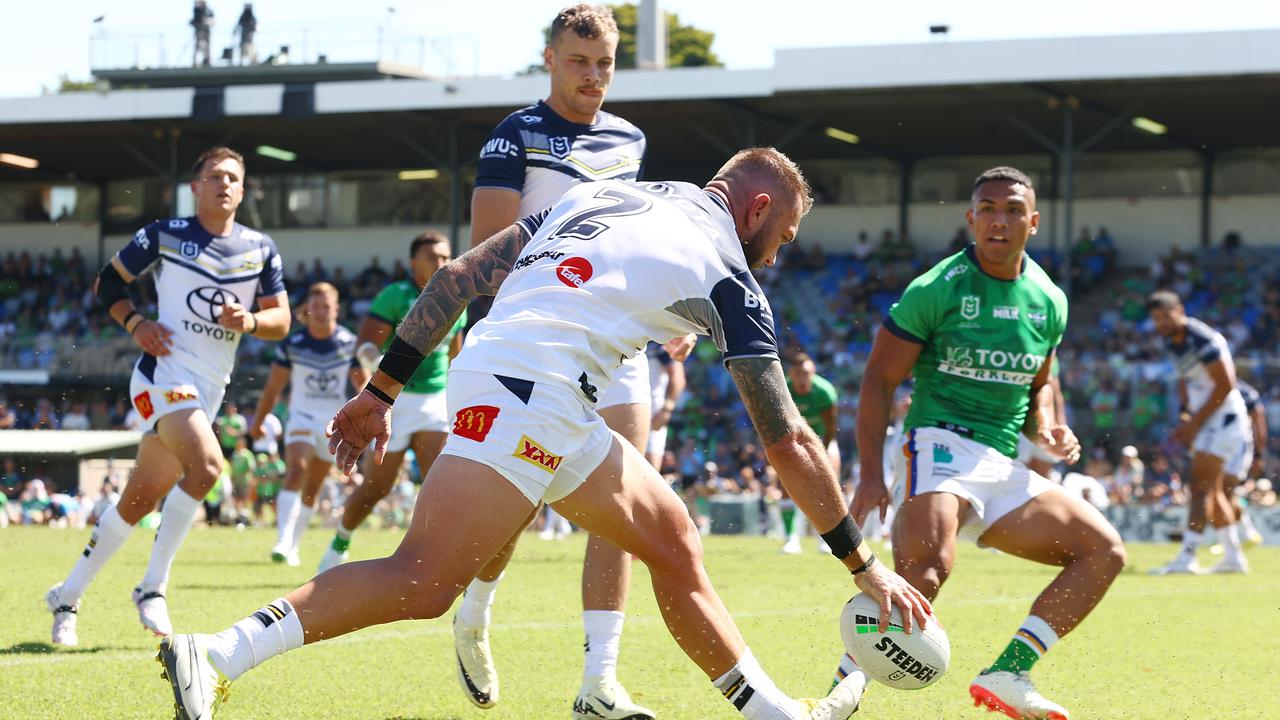 Feldt scores one of his three tries in the pre-season trial match against the Raiders. (Photo by Mark Nolan/Getty Images)