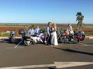 WHEEL LOVE STORY: Bundy bikers Tony and Tonia following their wedding ceremony on Saturday. Picture: Mark Stokes