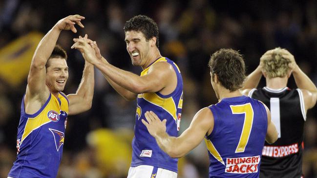 Ben Cousins and Dean Cox celebrate a win during their time together at West Coast.