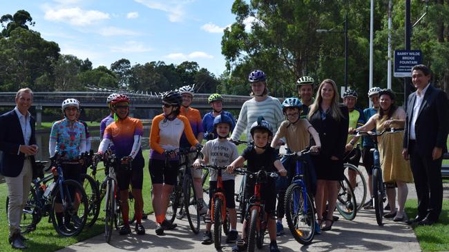 Active Transport Minister Rob Stokes, with Katie Mullens (fifth from right) and Parramatta state Liberal MP Geoff Lee.