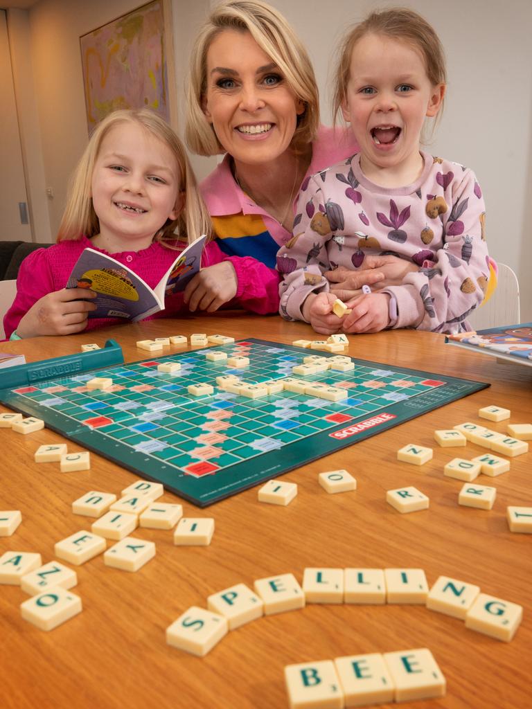 Fox Footy presenter Sarah Jones says the Prime Minister’s Spelling Bee initiative is “fantastic”. Jones is pictured at home with daughters Mila, 7, and Halle, 5. Picture: Tony Gough