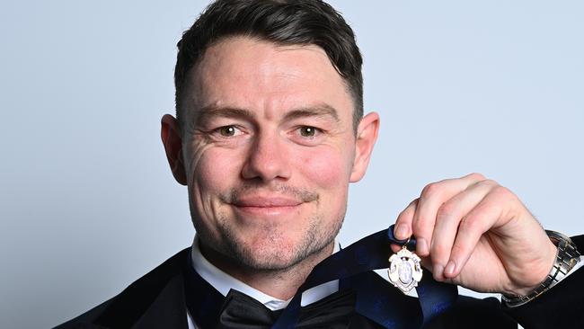 Lachie Neale of the Lions with the Brownlow Medal (Photo by Albert Perez/AFL Photos via Getty Images)