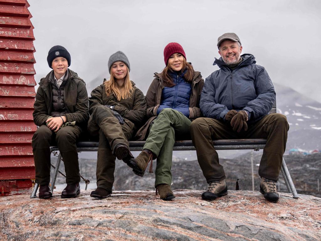 Denmarks's King Frederick X, Queen Mary, Princess Josephine and Prince Vincent pose on a bench during a visit in Qeqertarsuaq in Greenland, on June 30, 2024. Picture: Ida Marie Odgaard / Ritzau Scanpix / AFP) / Denmark OUT