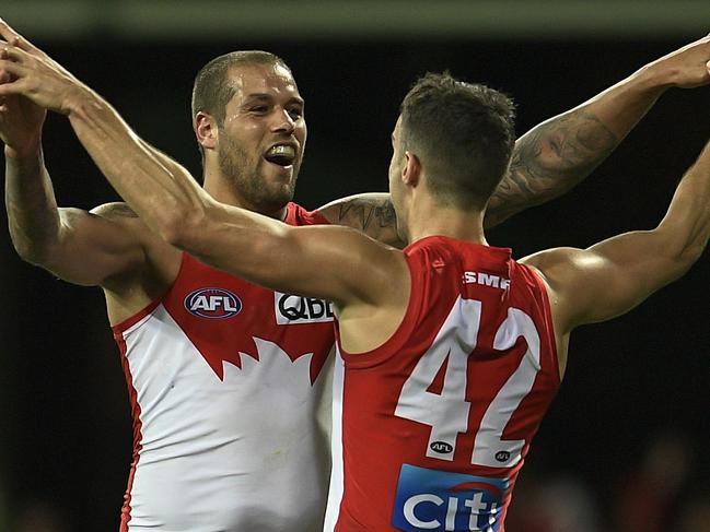 Lance Franklin and Xavier Richards whoop it up in 2016.