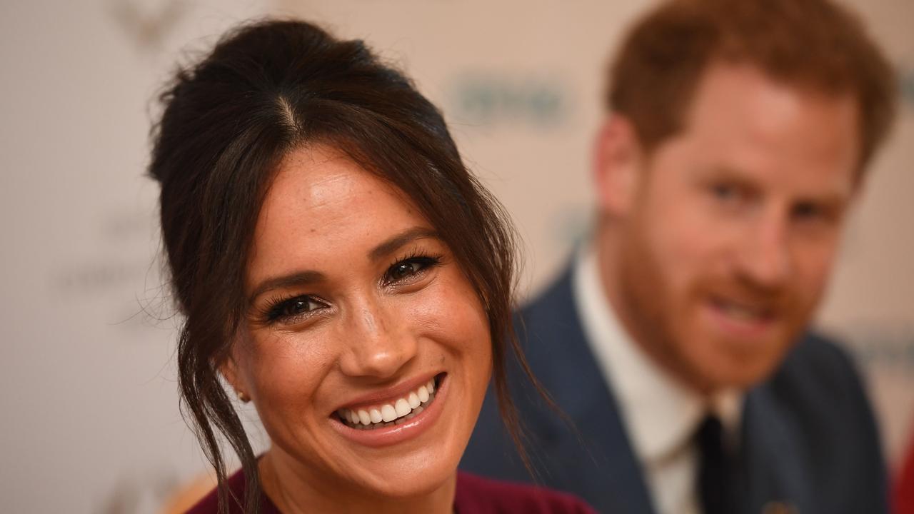 In giving up the HRH before their names, Harry and Meghan could be laughing all the way to the bank. Picture: Jeremy Selwyn/ AFP