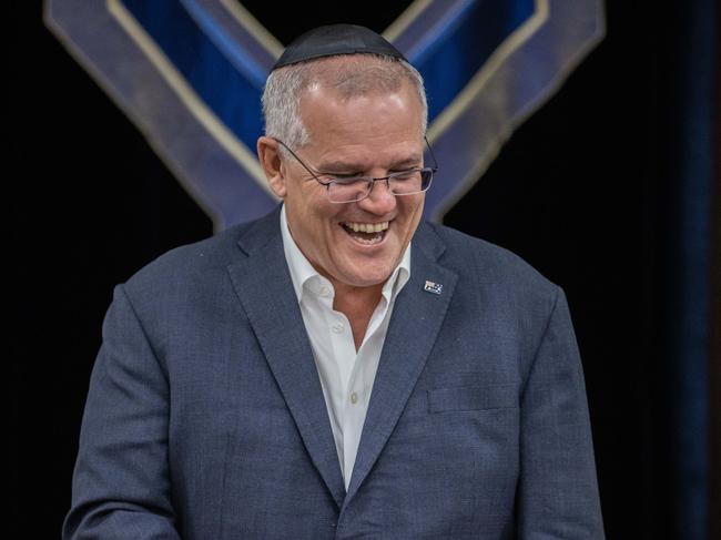 The prime minister shares a light moment with the gathered at the Hawthorne synagogue. Picture: Jason Edward