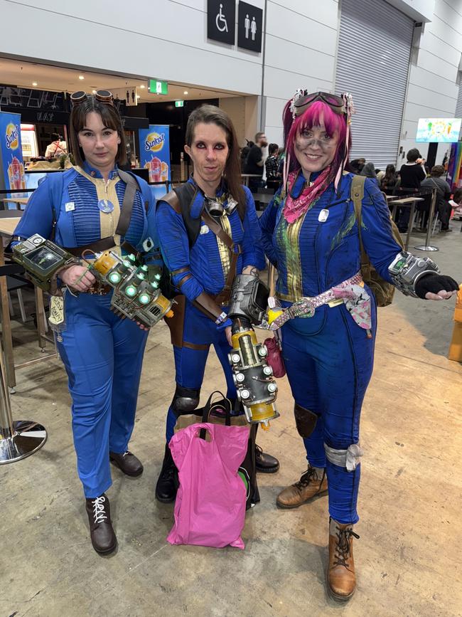 Dana Maynard, Callum Bruce and Lara Ratten attend the Oz Comic Con Melbourne at the Melbourne Convention & Exhibition Centre on Saturday, June 07, 2025. Picture: Jack Colantuono