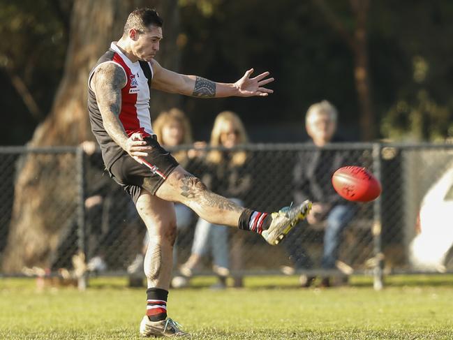 Aaron Edwards takes a kickfor St Kilda City. Picture: Valeriu Campan