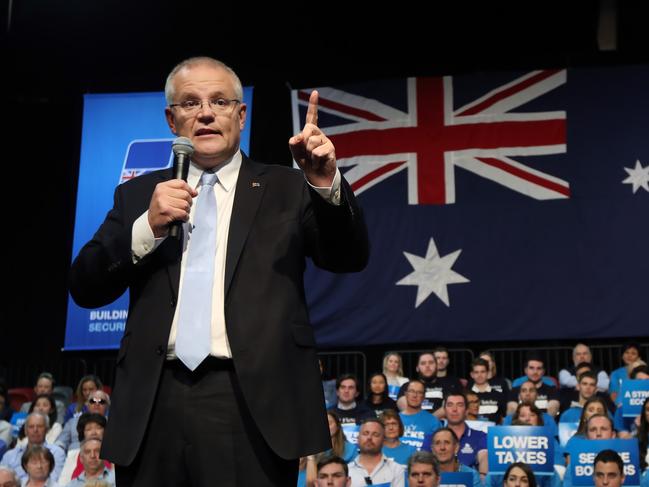 Prime Minister Scott Morrison campaigning at a liberal party campaign rally at in Sydney, with NSW Premier Gladys Berejiklian and former PM John Howard. Picture: Gary Ramage