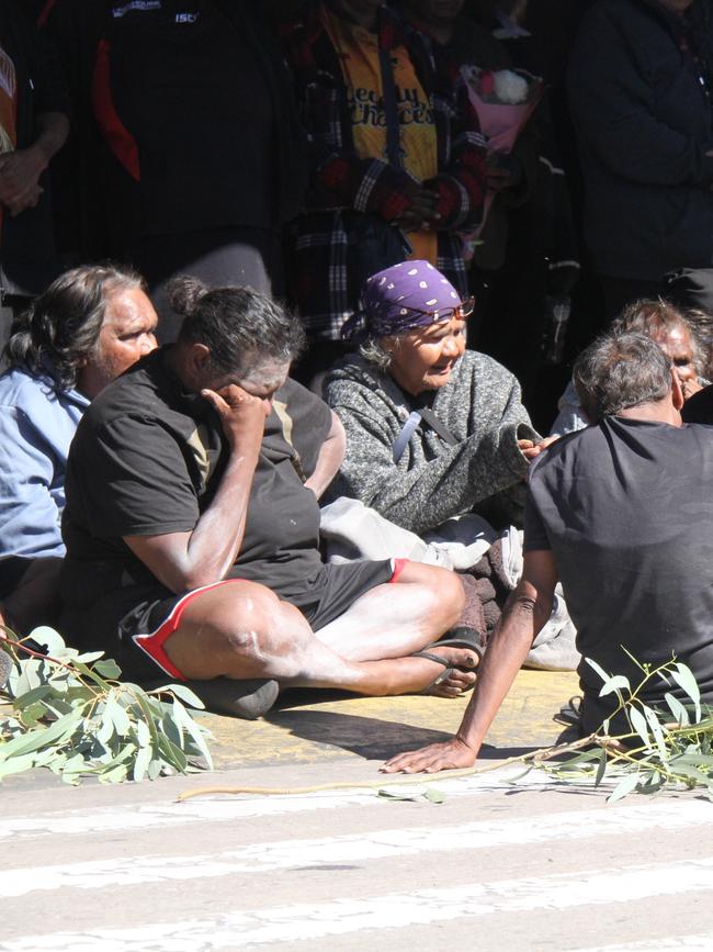 The mother and family of a 24-year-old man from Yuendumu at a vigil outside Coles in Alice Springs on Friday. Picture: Gera Kazakov