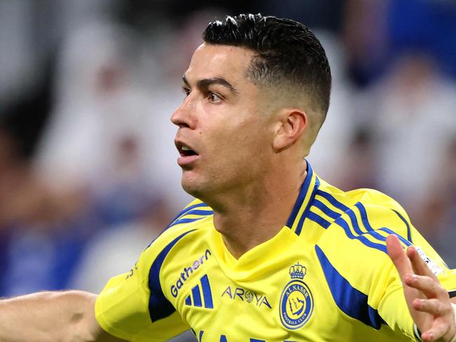 (FILES) Nassr's Portuguese forward #7 Cristiano Ronaldo celebrates scoring his team's second goal during the Saudi Pro League football match between Al-Hilal and Al-Nassr at the Kingdom Arena stadium in Riyadh on April 4, 2025. Ronaldo indicated on May 27 that he could leave Al Nassr after declaring that a 