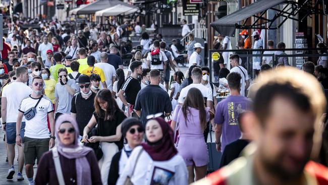 Tourists crowd a street in the centre of Amsterdam. Picture; AFP.