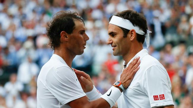 Two of the greats... Rafael Nadal (L), pictured with Roger Federer, has spoken out against the ban.