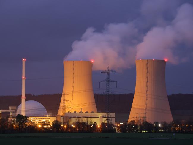 GROHNDE, GERMANY - NOVEMBER 08: Steam rises from cooling towers of the Grohnde Nuclear Power Plant on November 08, 2021 near Grohnde, Germany. The 1360 megawatt plant, which is operated by PreussenElektra, is scheduled to shut down at the end of this year. In all four nuclear power plants across Germany are scheduled to cease operation by the end of 2021 as part of Germany's ongoing exit from nuclear power. (Photo by Sean Gallup/Getty Images)