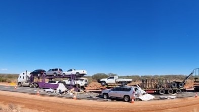 After 9am last Saturday, Victorian man Daniel Penn and his wife and two children, aged 10 and 14, were on their way back home after a five week road trip to the Northern Territory, when a road train crashed into them on the Stuart Hwy.