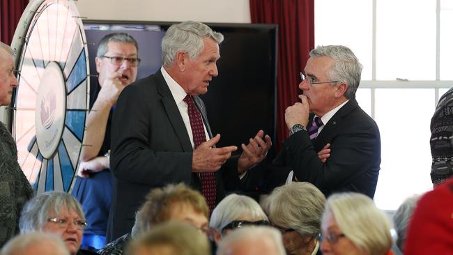 Southern Cross Care chairman Ray Groom, left, speaks with Independent Federal MP for Denison Andrew Wilkie after the meeting.