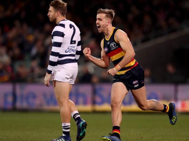 ADELAIDE, AUSTRALIA - JULY 12: Jordan Gallucci of the Crows celebrates a goal during the 2018 AFL round 17 match between the Adelaide Crows and the Geelong Cats at Adelaide Oval on July 12, 2018 in Adelaide, Australia. (Photo by James Elsby/AFL Media/Getty Images)