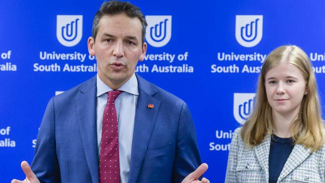 Education Minister Blair Boyer announced the program next to first year apprentice Alicia. Picture: RoyVPhotography