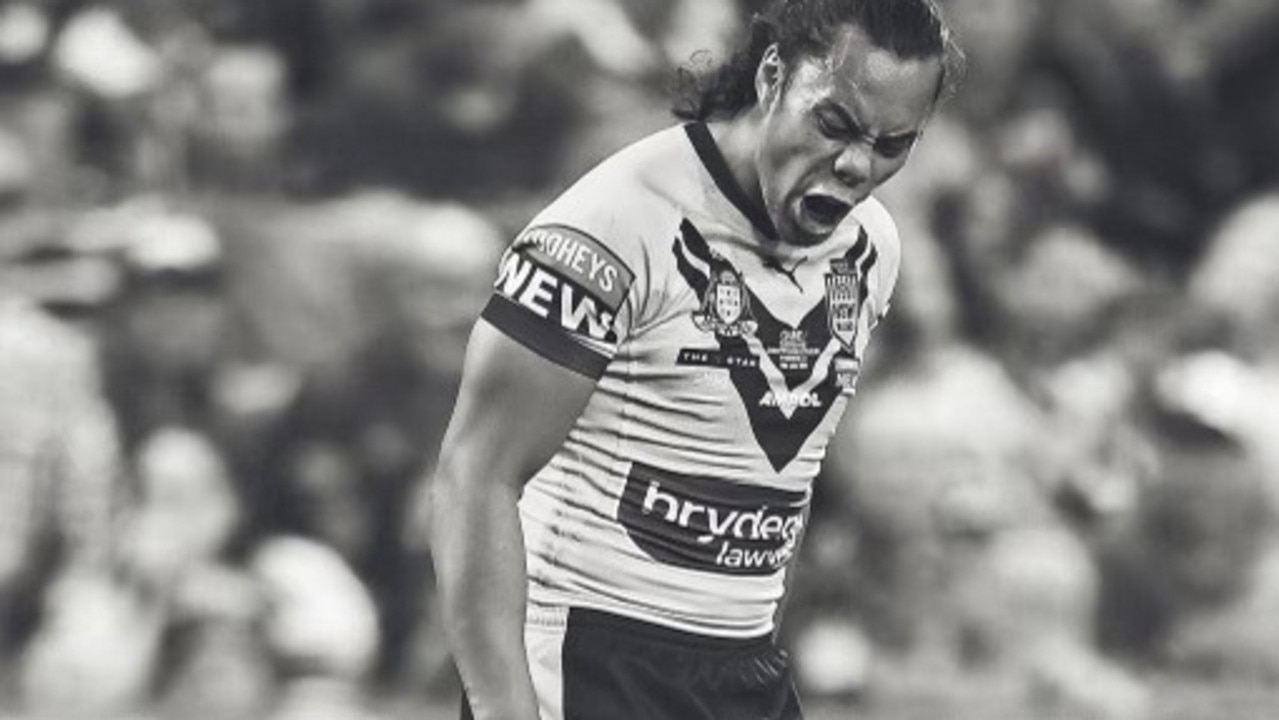 Jarome Luai gives it to Felise Kaufusi during Origin I in Townsville.