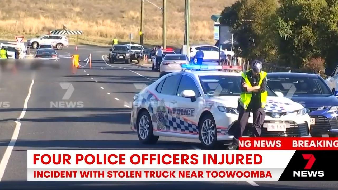 Four police officers have been injured and three police vehicles have been damaged following an alleged stolen truck incident north of Toowoomba today. Picture: 7 NEWS