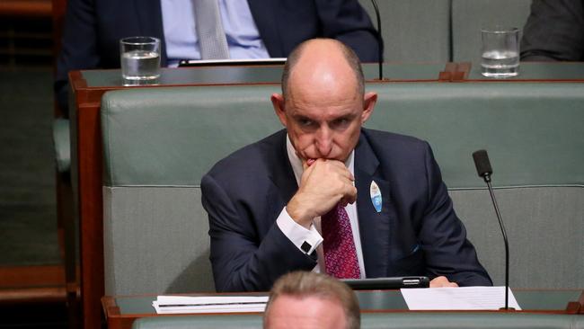 Former minister in the Abbott Government Stuart Robert listens during Question Time in the House of Representatives, federal Parliament, Canberra.