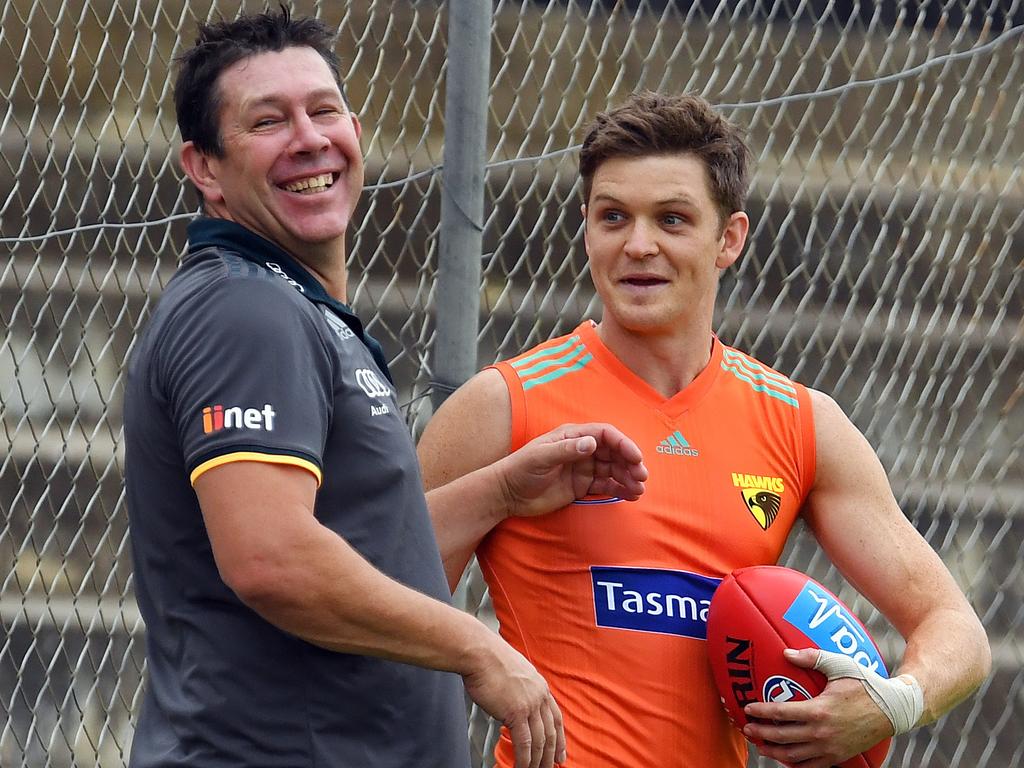 11/03/17 - Hawthorn training at Richmond Oval, ahead of Sunday's pre-season clash with Port Adelaide. Hawks assistant coach Brett Ratten and player Taylor Duryea. Picture: Tom Huntley