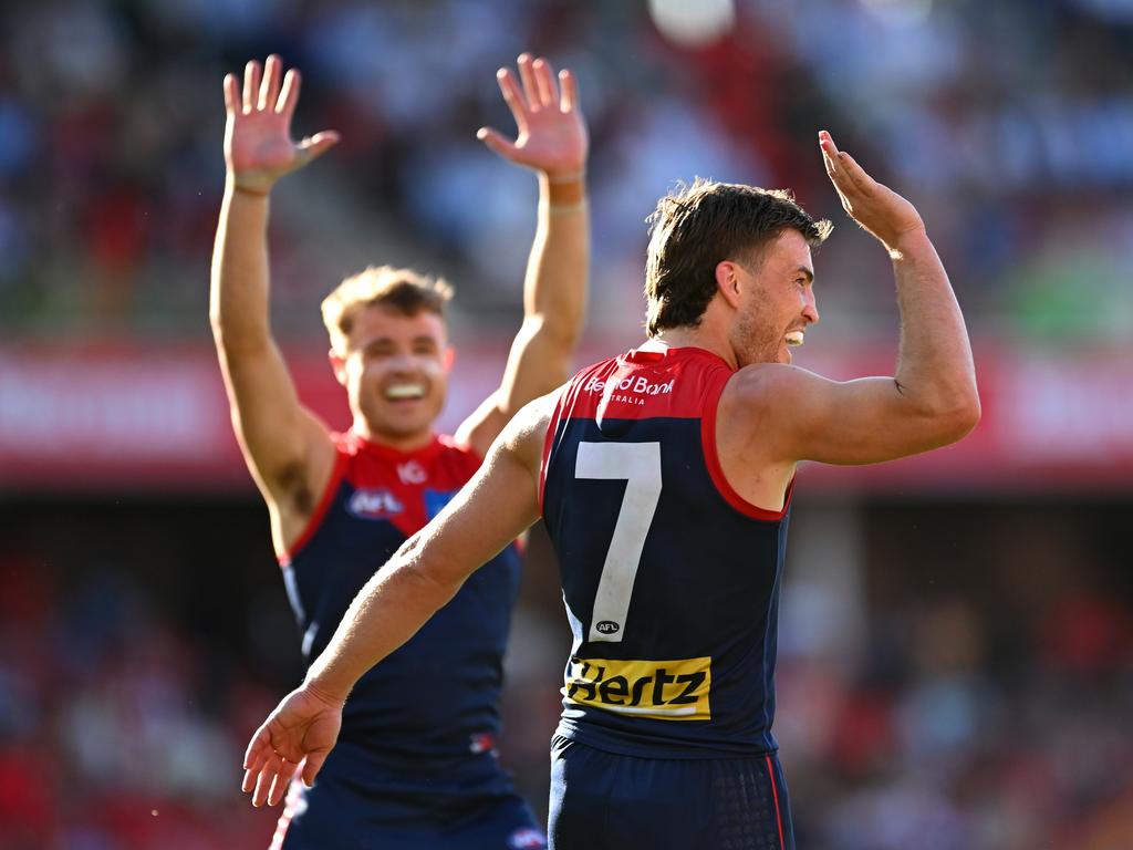 GOLD COAST, AUSTRALIA – AUGUST 17: Jack Viney of the Demons celebrates with teammates after kicking a goal during the round 23 AFL match between Gold Coast Suns and Melbourne Demons at People First Stadium, on August 17, 2024, in Gold Coast, Australia. (Photo by Albert Perez/AFL Photos via Getty Images)