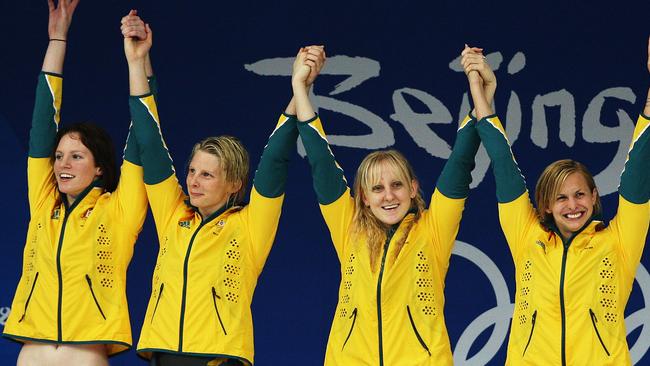 Australia's Emily Seebohm, Leisel Jones, Jessicah Schipper and Libby Trickett celebrate their gold at the Beijing Olympics in 2008. Pic. Brett Costello