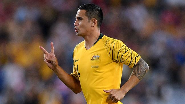 Tim Cahill runs onto the field for the final time as a Socceroos player. Picture: AAP