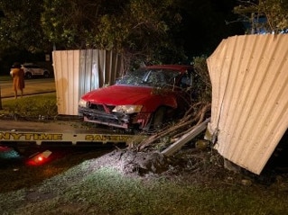 A learner driver, 18, crashed through the front fence of a Rasmussen home early on Sunday morning after she was allegedly drinking. Photo: 7News Townsville