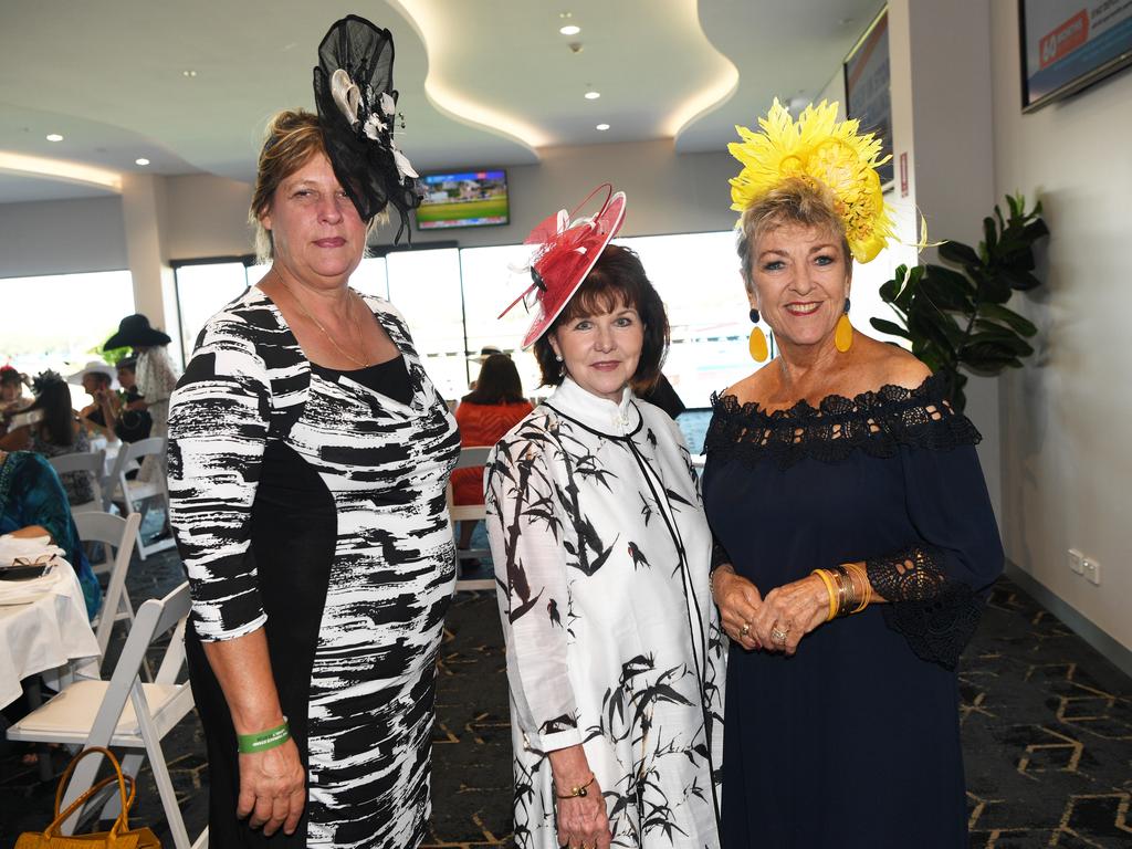 Karen Merchant, Nannette Holiday and Fay Miller at the Darwin Turf Club Bridge Toyota Ladies' Day / Derby Day. Picture: KATRINA BRIDGEFORD