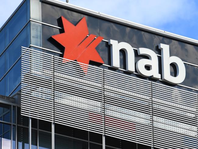 General view of NAB signage at the company's head office in Melbourne, Tuesday March 17, 2020. NAB employees have been evacuated from the head office following a staff member being confirmed as positive to coronavirus today. (AAP Image/James Ross) NO ARCHIVING