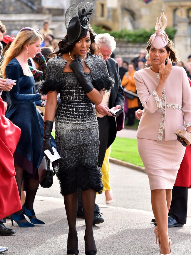 Naomi wore a striking black and white textured dress with matching mini cape. Picture: Getty