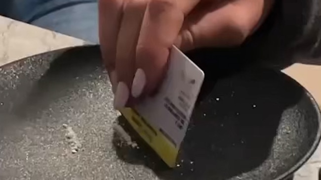 Jamie Kah seen in images with a white powder.