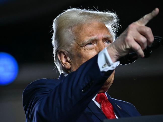 US President Donald Trump delivers remarks on his policy to end tax on tips in Las Vegas, Nevada, on January 25, 2025. After visits to disaster sites in North Carolina and California, the Vegas stop is more of a feel-good victory lap, as he lays out his plans to exclude tips from federal taxes -- an enormously popular move in a city built on the hospitality industry. (Photo by Mandel NGAN / AFP)