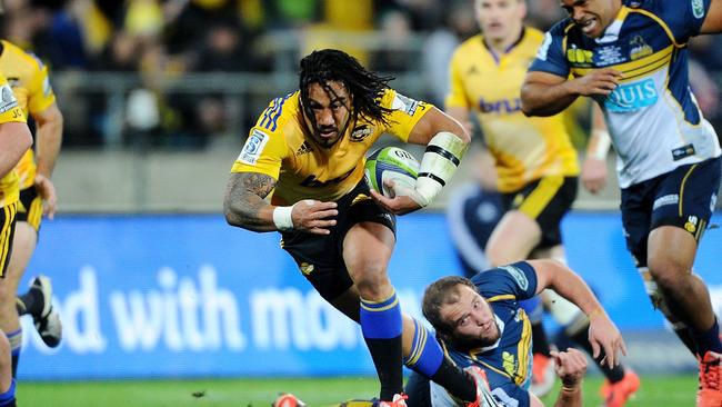 Ma'a Nonu breaks through a tackle during the Super Rugby semi-final between the Hurricanes and the Brumbies at Westpac Stadium.