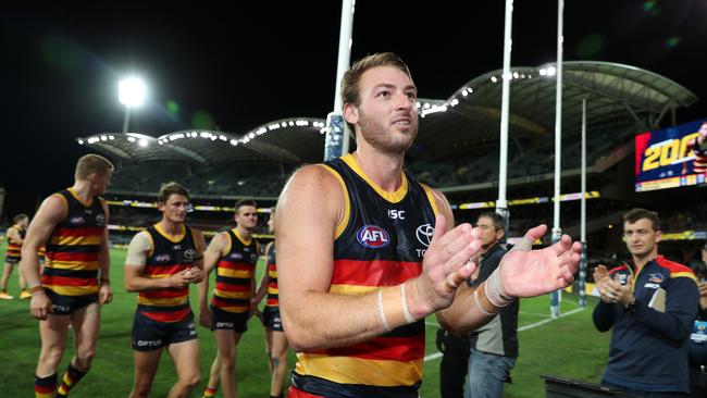 AFL - Saturday, 19th September, 2020 - Adelaide Crows v Richmond at the Adelaide Oval. Adelaide's Daniel Talia leads the team off in the last game of the year and his 200th game Picture: Sarah Reed