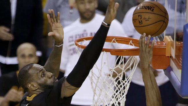 Cleveland Cavaliers forward LeBron James (23) blocks a shot by Golden State Warriors forward Andre Iguodala (9).