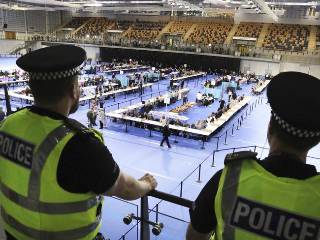 A Tory source says ‘the knives are out’ for Mrs May. Pictured, votes are counted at the Emirates Arena in Glasgow, Scotland. Picture: Andrew Milligan/PA via AP