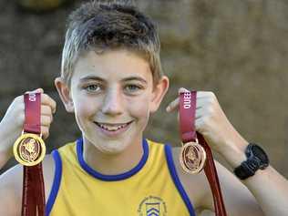 GOLDEN MOMENT: Toowoomba Grammar School student Charlie Randall defended his under-12 cross-country title at the Queensland championships. He also captained the Darling Downs relay team to third place at the championships. Picture: Kevin Farmer