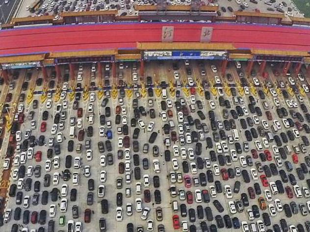 Vehicles are seen stuck in a traffic jam near a toll station in Beijing after a national holiday last year. PHOTO: REUTERS