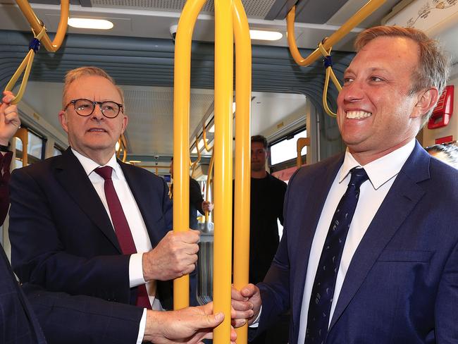 Premier Steven Miles and Prime Minister Anthony Albanese ride on the light rail on the Gold Coast. Pics Adam Head