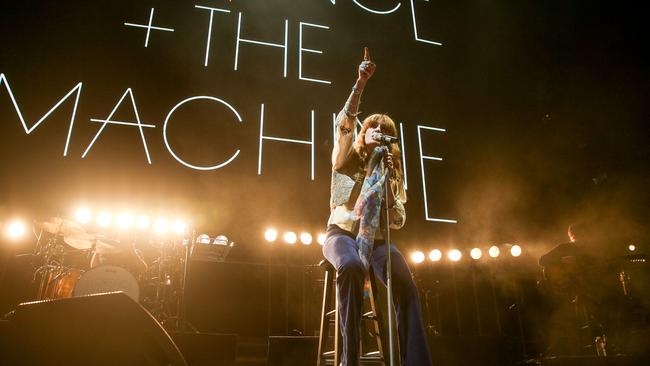 Seated Flo: This is how you rock out on a stool with a broken foot. (Photo by Rich Fury/Invision/AP)