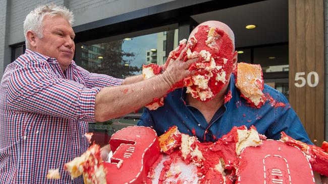 Danny Frawley celebrates Bounce’s 350th episode by smashing a cake on Jason Dunstall’s face. Picture: Jay Town