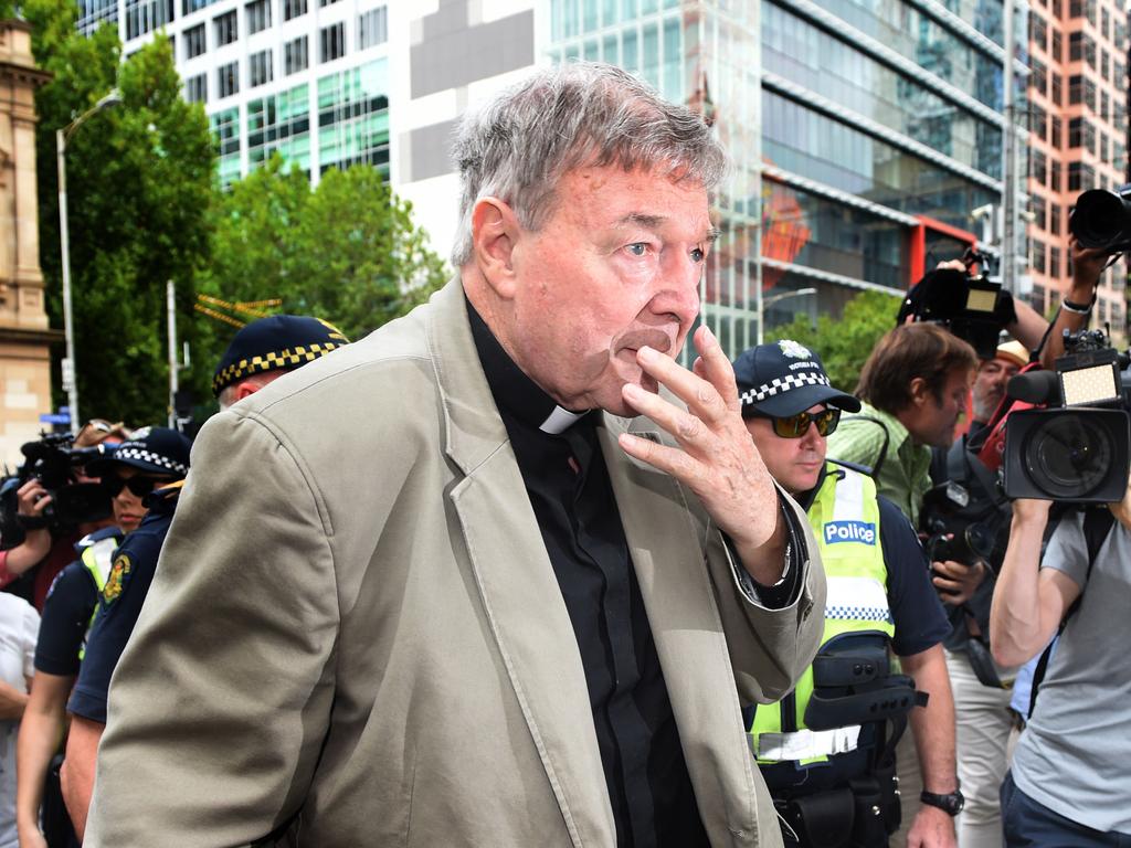 George Pell arrives at the Melbourne Magistrate Court.Suppression order expected to be lifted today as OPP expected to drop remaining charges ahead of doomed to fail second trial. George Pell, Australia's highest-ranking Catholic who is currently due to stand trial charged with historical sexual offences. Picture: Tony Gough